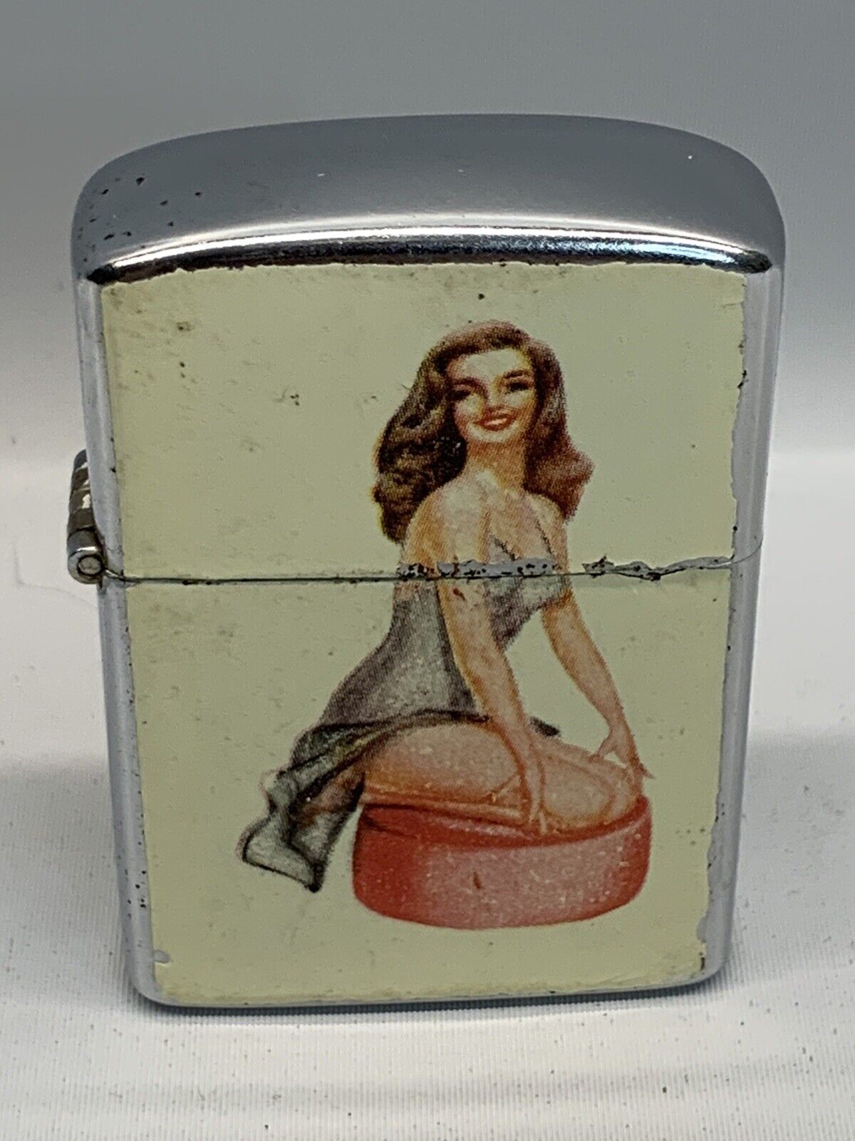 Invicta Pin Up Girl Lighter Japan Unfired Insert.  Paint has storage chips, looks like it was never carried.